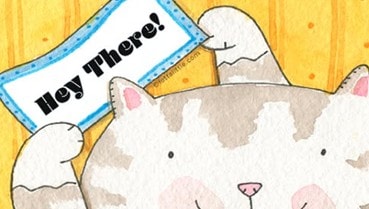 Cute cat holding Hey There! sign